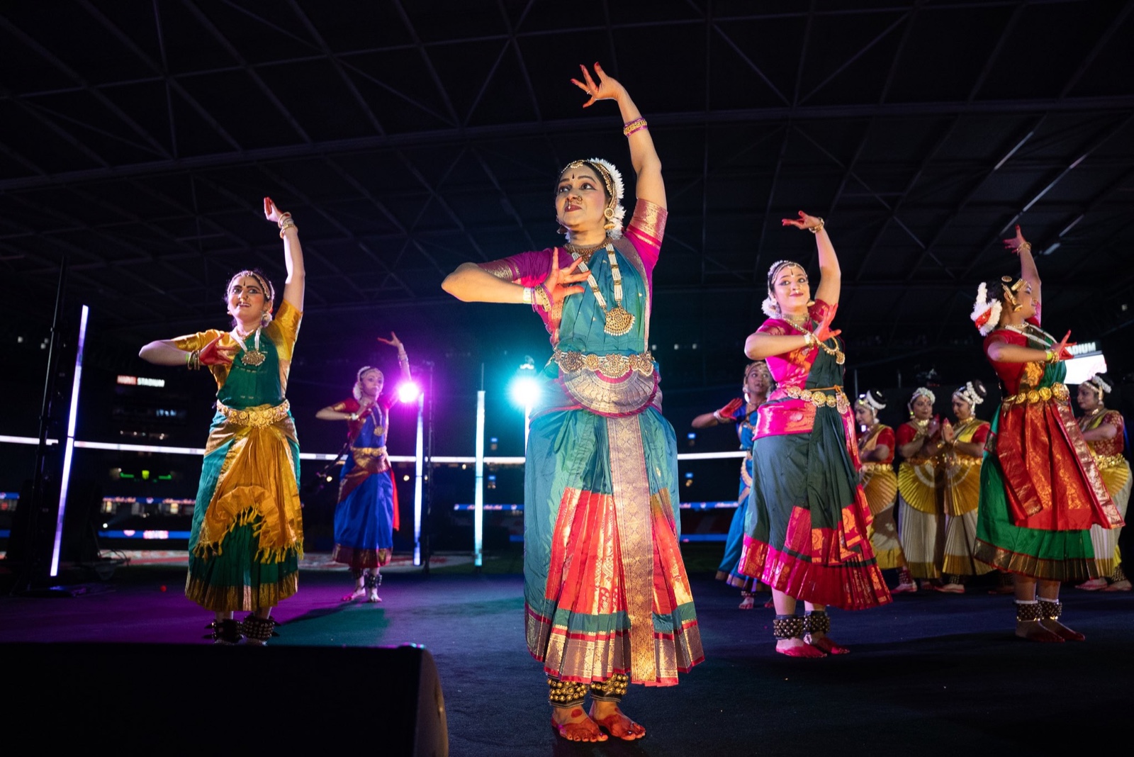 Classical Indian dancers perform before the address at Marvel Stadium